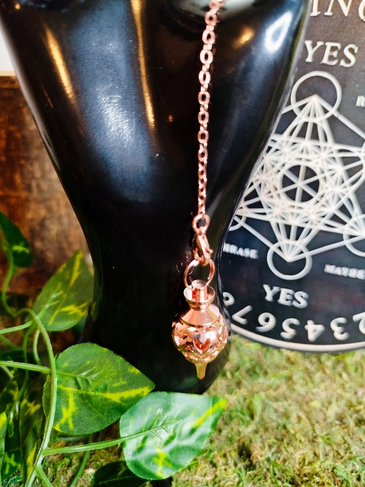 Pendule divinatoire rose doré en lanterne