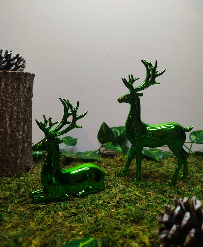 Cerfs décoratifs verts pour décoration de Noël